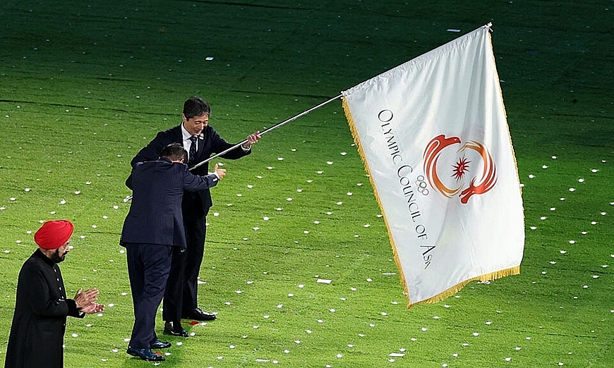 Nghi thức trao cờ đăng cai ASIAD 20 cho đại diện thành phố Nagoya (Nhật Bản). Ảnh: Tân Hoa xã