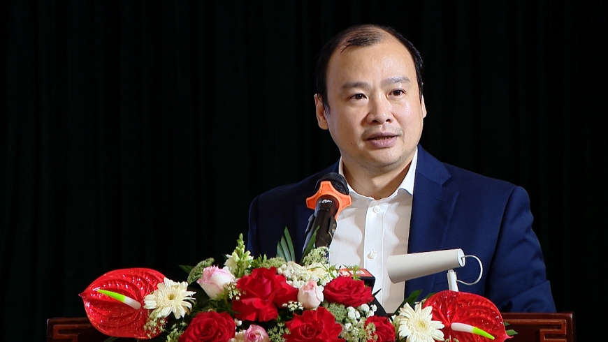 Đồng chí Lê Hải Bình, Tổng Biên tập Tạp chí Cộng sản báo cáo đề dẫn tại Hội thảo