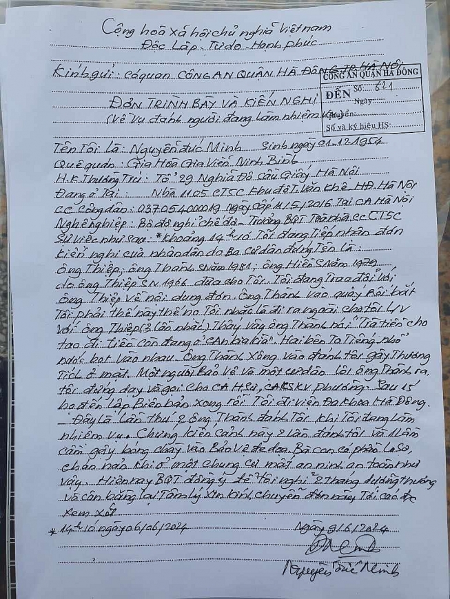 Đơn của ông Nguyễn Đức Minh trình báo Công an quận Hà Đông về việc bị hành hung.