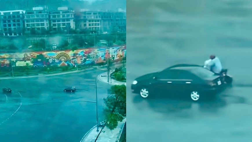 Trong mưa bão, những chiếc ô tô tình nguyện chạy song song, che chắn cho xe máy, người đi đường di chuyển đến nơi an toàn hơn, tránh bị gió cuốn. Ảnh: Báo Quảng Ninh.