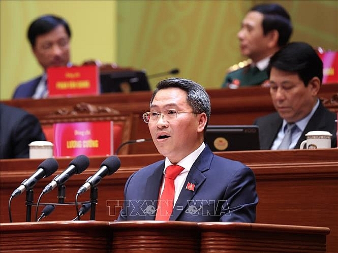 Đồng chí Nguyễn Tấn Phát, Thành ủy viên, Bí thư Đảng ủy phường Sài Gòn (TP Hồ Chí Minh), trình bày tham luận “Lãnh đạo phát triển kinh tế tư nhân nhanh và bền vững” chiều 21/1. Ảnh: TTXVN