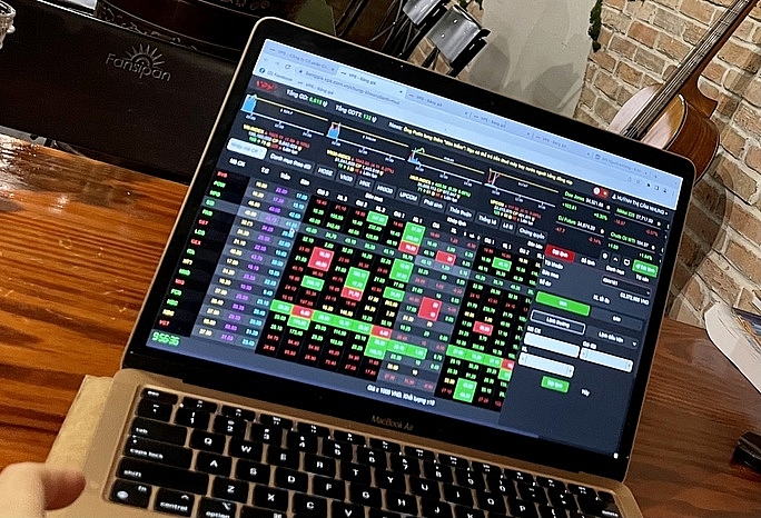 Dự báo chứng khoán sau lễ sẽ tích cực. Ảnh: NLĐ