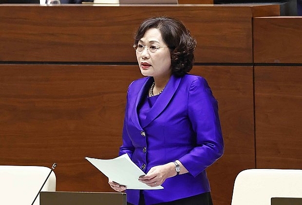 Thống đốc Ngân hàng Nhà nước Việt Nam Nguyễn Thị Hồng trả lời chất vấn. Ảnh: TTXVN