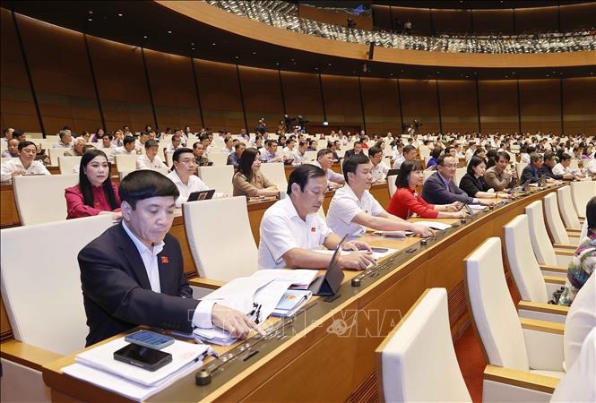 Đoàn đại biểu Quốc hội tỉnh Hải Dương biểu quyết thông qua Luật Thanh tra (sửa đổi). Ảnh: Doãn Tấn/TTXVN