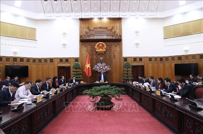Thủ tướng Phạm Minh Chính chủ trì họp Thường trực Chính phủ về chính sách tài khoá, tiền tệ. Ảnh: Dương Giang/TTXVN