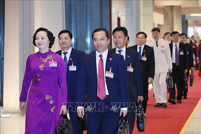 Đại biểu các đoàn Đảng bộ tỉnh Yên Bái và Thanh Hóa dự phiên khai mạc Đại hội. Ảnh: TTXVN