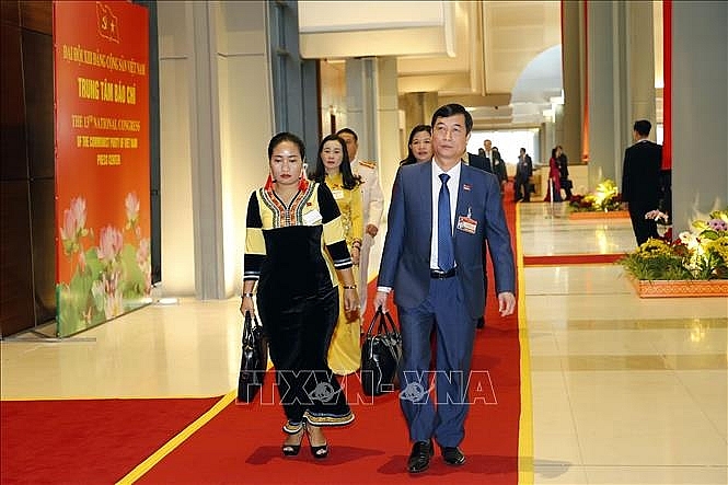 Các đại biểu đến dự phiên khai mạc Đại hội. Ảnh: TTXVN
