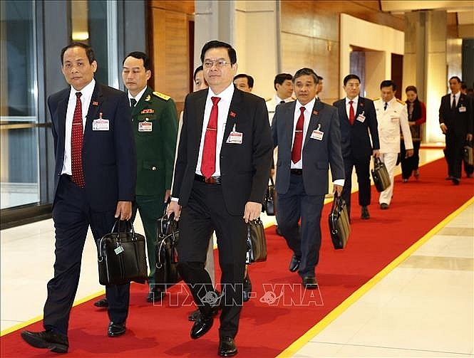 Các đại biểu đến dự phiên khai mạc Đại hội. Ảnh: TTXVN