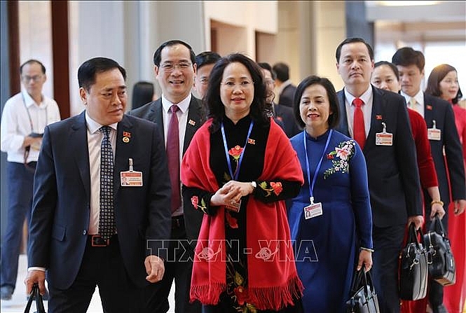 Các đại biểu đến dự phiên khai mạc Đại hội. Ảnh: TTXVN