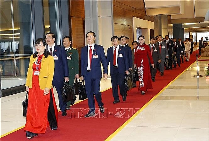 Các đại biểu đến dự phiên khai mạc Đại hội. Ảnh: TTXVN