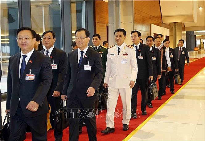 Các đại biểu đến dự phiên khai mạc Đại hội. Ảnh: TTXVN