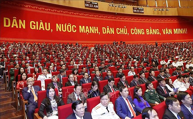  Các đại biểu dự phiên khai mạc Đại hội lần thứ XIII của Đảng. Ảnh: TTXVN