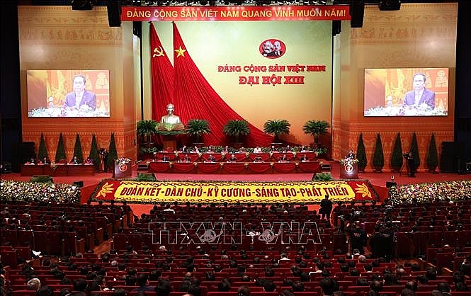 Đại hội nghe đồng chí Trần Thanh Mẫn, Bí thư Trung ương Đảng, Chủ tịch Ủy ban Trung ương Măt trận Tổ quốc Việt Nam trình bày tham luận. Ảnh: TTXVN