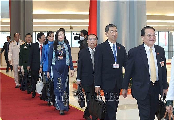 Các đại biểu đến dự phiên họp sáng 30/1. Ảnh: TTXVN