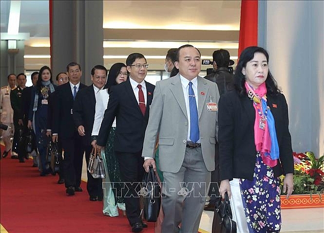 Các đại biểu đến dự phiên họp sáng 30/1. Ảnh: TTXVN