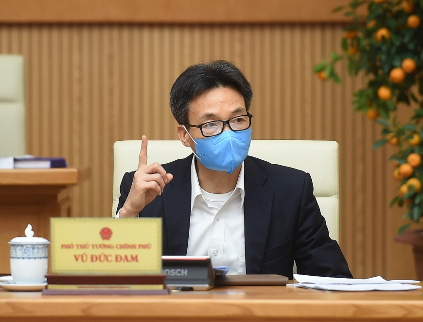 Phó Thủ tướng Chính phủ Vũ Đức Đam, Trưởng Ban Chỉ đạo quốc gia phòng chống dịch COVID-19 phát biểu tại cuộc họp. - Ảnh: VGP/Quang Hiếu