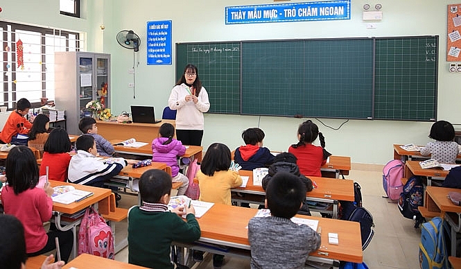 Giữ phương thức tuyển sinh đầu cấp ổn định sẽ giúp các địa phương, nhà trường chủ động hơn trong việc chuẩn bị cho năm học 2021-2022. Trong ảnh: Một tiết học của học sinh lớp 1 Trường Tiểu học Nguyễn Bá Ngọc (quận Ba Đình). Ảnh: Đỗ Tâm