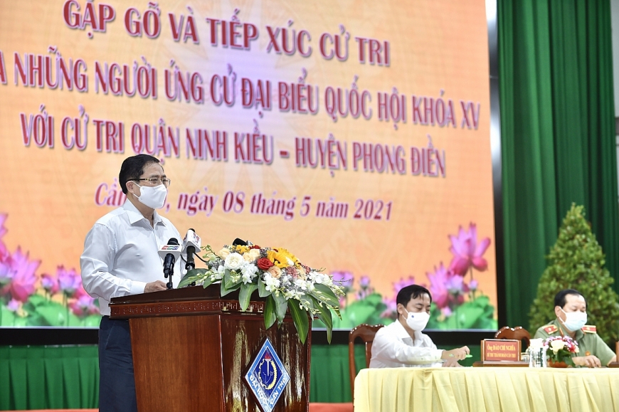 Thủ tướng Phạm Minh Chính phát biểu tại buổi gặp gỡ, tiếp xúc cử tri quận Ninh Kiều, huyện Phong Điền. Ảnh: VGP/Nhật Bắc