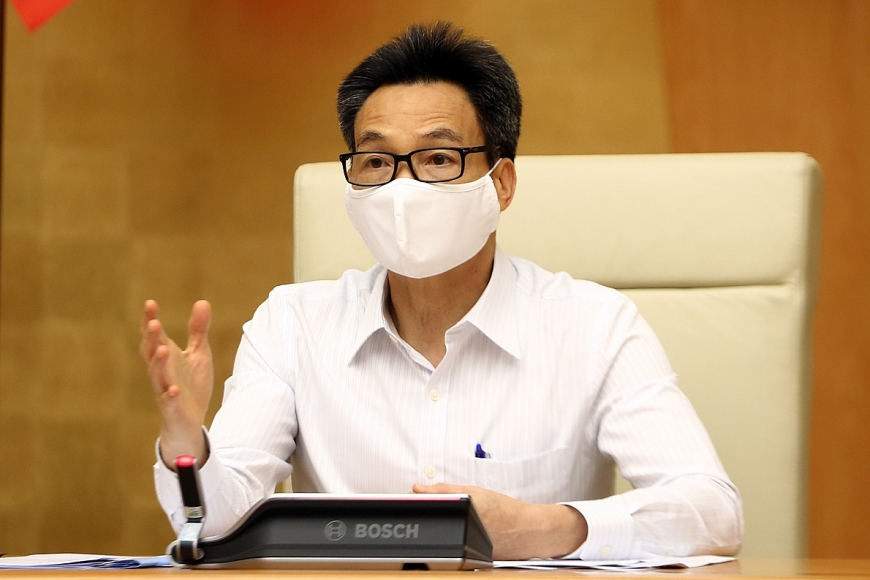 Phó Thủ tướng Vũ Đức Đam yêu cầu phải đổi mới, tăng cường kỷ cương, siết chặt quản lý việc tiếp nhận, đón, cách ly người nhập cảnh. Ảnh: VGP/Đình Nam