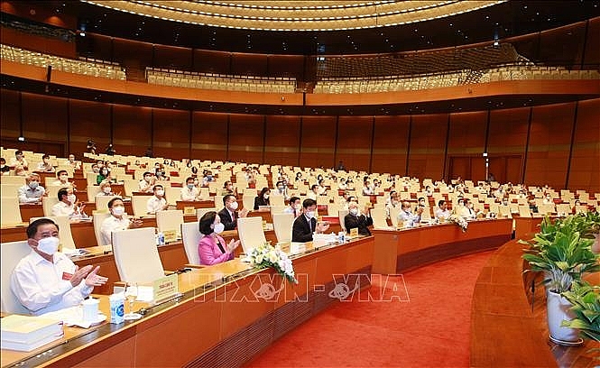 Tổng Bí thư Nguyễn Phú Trọng, Chủ tịch nước Nguyễn Xuân Phúc, Thủ tướng Chính phủ Phạm Minh Chính, Chủ tịch Quốc hội Vương Đình Huệ và các đại biểu dự hội nghị. Ảnh: Phương Hoa/TTXVN