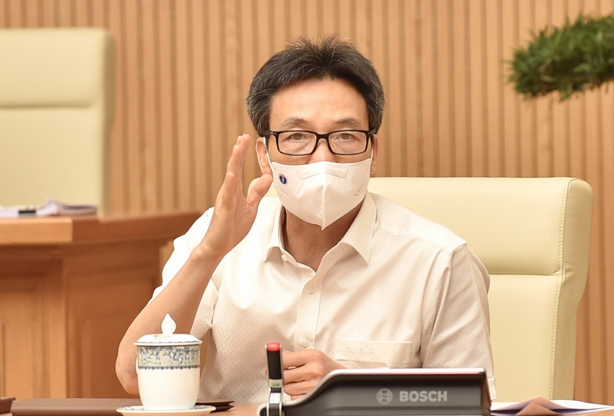 Phó Thủ tướng Vũ Đức Đam yêu cầu các tỉnh phải thực hiện nghiêm việc cập nhật tình hình dịch bệnh lên hệ thống thông tin, phân tích dữ liệu, điều tra dịch tễ phục vụ công tác chỉ đạo, điều hành chống dịch, cũng như truy vết, lấy mẫu xét nghiệm có trọng tâm, trọng điểm. Ảnh: VGP/Nhật Bắc