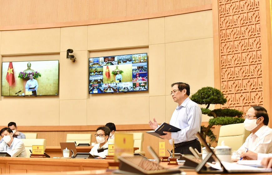 Thủ tướng nêu rõ tinh thần nhất quán chống dịch như chống giặc, tích cực, hiệu quả hơn nữa trong chuyển trạng thái từ phòng ngự sang tấn công. Ảnh: VGP/Nhật Bắc