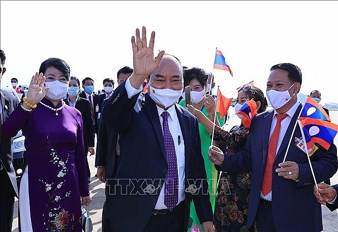 Lễ đón Chủ tịch nước Cộng hòa xã hội chủ nghĩa Việt Nam Nguyễn Xuân Phúc và Phu nhân cùng Đoàn đại biểu cấp cao Đảng và Nhà nước Việt Nam tại Sân bay quốc tế Wattay, Thủ đô Vientiane. Ảnh: Thống Nhất/TTXVN