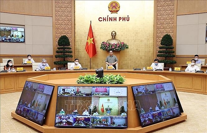 Thủ tướng Phạm Minh Chính chủ trì cuộc họp. Ảnh: Dương Giang/TTXVN