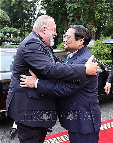 Thủ tướng Phạm Minh Chính đón Thủ tướng nước Cộng hòa Cuba Manuel Marrero Cruz. Ảnh: Dương Giang/TTXVN