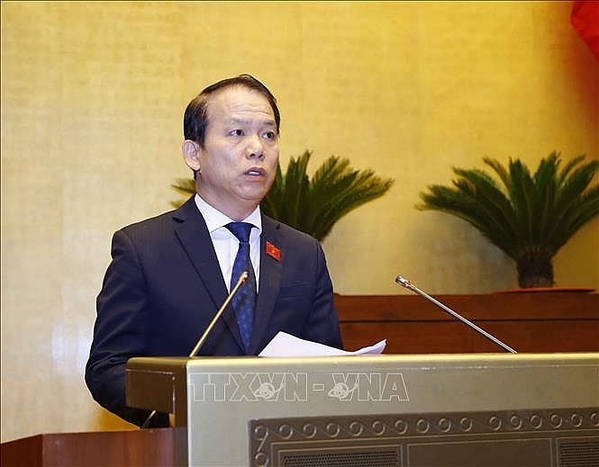 Ủy viên Ủy ban Thường vụ Quốc hội, Chủ nhiệm Ủy ban Pháp luật của Quốc hội Hoàng Thanh Tùng trình bày Báo cáo giải trình, tiếp thu, chỉnh lý dự thảo Nghị quyết về tổ chức chính quyền đô thị tại Thành phố Hồ Chí Minh. Ảnh: Doãn Tấn/TTXVN