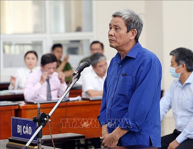 Bị cáo Lê Văn Thanh trả lời câu hỏi của Hội đồng xét xử. Ảnh: Phạm Kiên/TTXVN