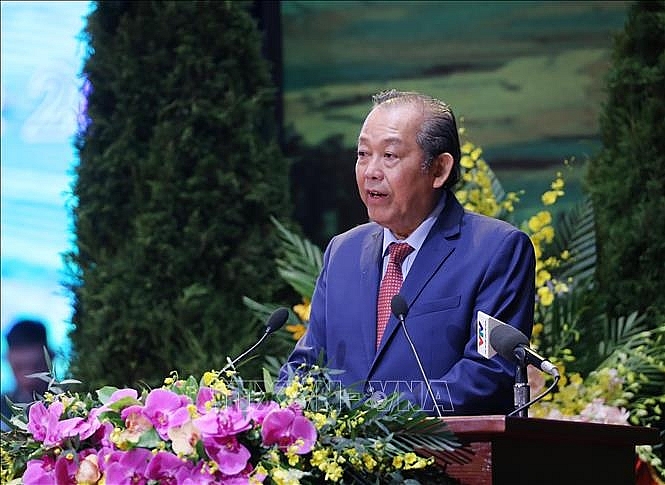 Đồng chí Trương Hòa Bình, Ủy viên Bộ Chính trị, Phó Thủ tướng Thường trực Chính phủ, Trưởng Ban Chỉ đạo Đại hội phát biểu. Ảnh: TTXVN