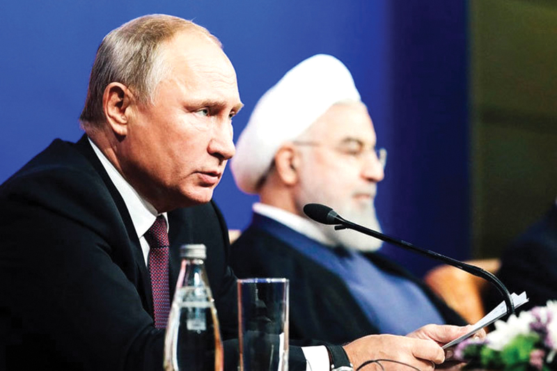 Tổng thống Nga Vladimir Putin v&agrave; người đồng cấp Iran Hassan Rouhani ở Tehran hồi th&aacute;ng 9/2018.