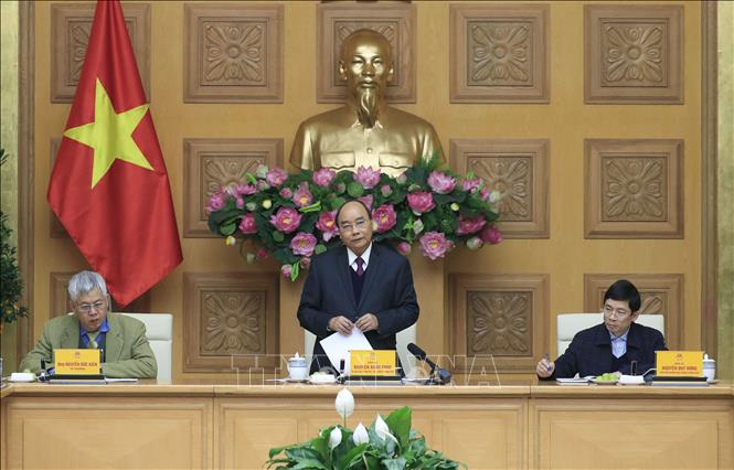 Thủ tướng Nguyễn Xu&acirc;n Ph&uacute;c l&agrave;m việc với Tổ tư vấn kinh tế của Thủ tướng. Ảnh: Thống Nhất/TTXVN