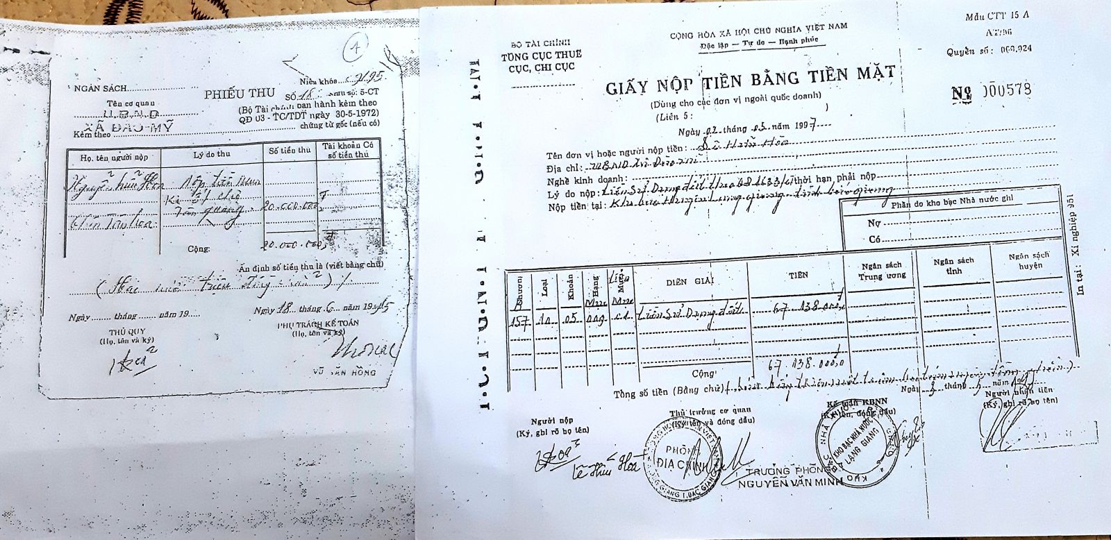 C&aacute;c hộ d&acirc;n d&atilde; ho&agrave;n th&agrave;nh nghĩa vụ t&agrave;i ch&iacute;nh dược giao đ&aacute;t d&atilde;n d&acirc;n khu vực chợ T&acirc;n Quang năm 1996