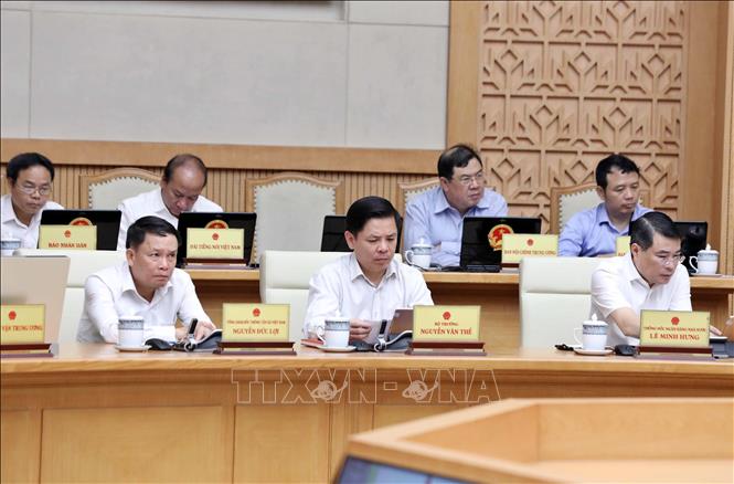 C&aacute;c đại biểu kh&aacute;ch mời v&agrave; th&agrave;nh vi&ecirc;n Ch&iacute;nh phủ tham dự phi&ecirc;n họp. Ảnh: Thống Nhất/TTXVN