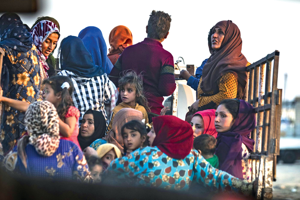 Người d&acirc;n sơ t&aacute;n tr&aacute;nh chiến sự ở Đ&ocirc;ng Bắc Syria ng&agrave;y 9/10/2019. Nguồn: AFP/TTXVN