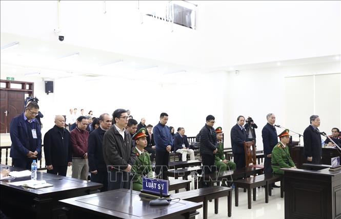 C&aacute;c bị c&aacute;o nghe t&ograve;a tuy&ecirc;n &aacute;n. Ảnh: Văn Điệp/TTXVN