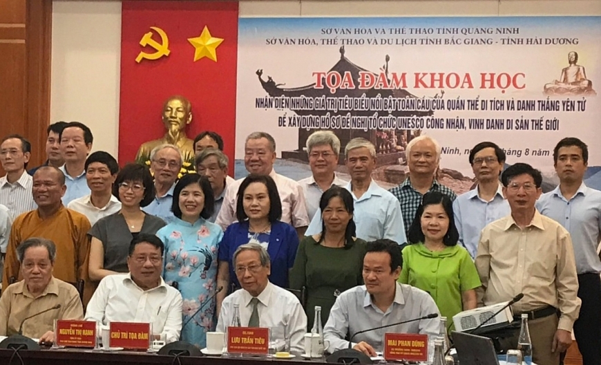 Tọa đàm khoa học Nhận diện những giá trị tiêu biểu nổi bật của quần thể Di tích và Danh thắng Yên Tử để xây dựng hồ sơ đề nghị tổ chức UNESCO công nhận, vinh danh Di sản thế giới. Ông Nguyễn Trần Trương (đứng) hàng thứ 2 từ phải sang.